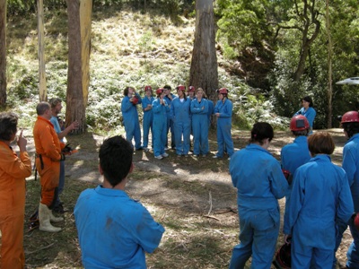 Group briefing for caving and abseiling